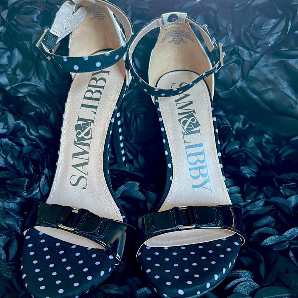 "Elevate your elegance with Cossete high-heeled sandals.